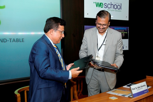 Mr%20Sudipto%20Sen,%20Regional%20Director-South%20East%20Asia,%20SAS%20India%20and%20Prof%20Dr%20Uday%20Salunkhe,%20Group%20Director,%20WeSchool%20exchanging%20books%20of%20MOU%20signed.jpg